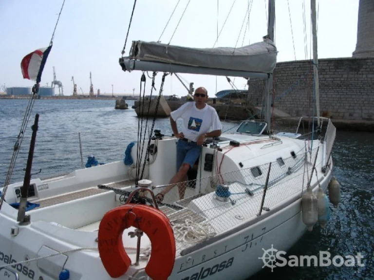 Bénéteau First 31.7 charter bareboat or skippered in  Mauguio