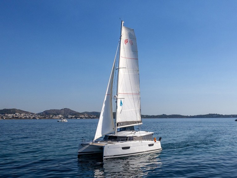 Fountaine Pajot Astrea 42 charter bareboat or skippered in  Alimos