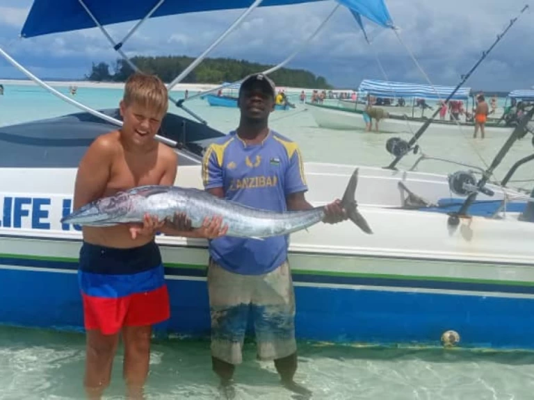 Chris Craft Calypso 26 Chris Craft Calypso 26 charter bareboat or skippered in  Pwani Mchangani