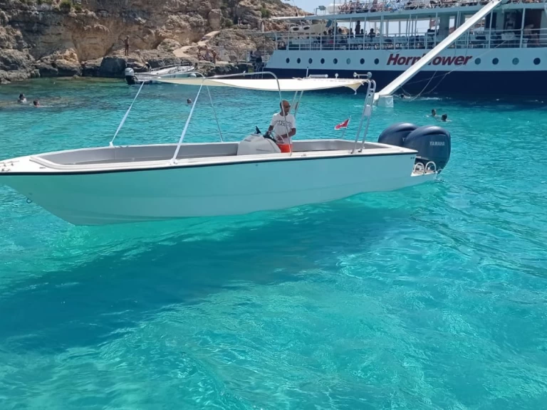 Crown Coronet charter bareboat or skippered in  Xemxija