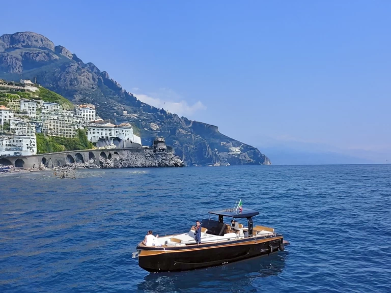 Allure 38 charter bareboat or skippered in  Porto di Amalfi Marina Coppola