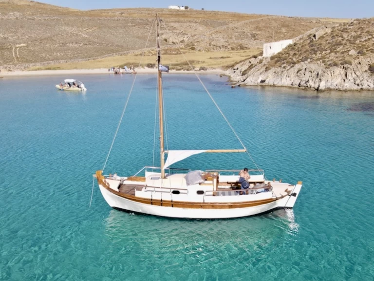 Charter a Traditional Wooden Boat in Ornos on Samboat