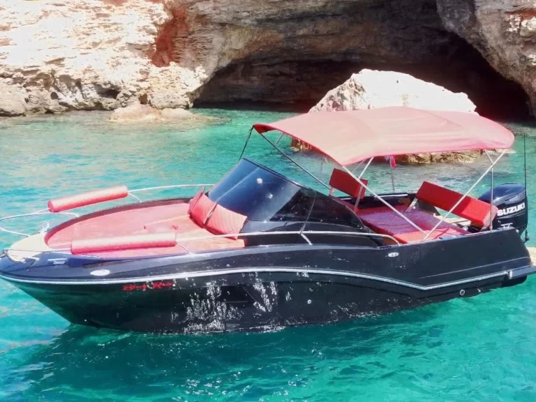 Yacht hire San Antonio Port cheap black ruby