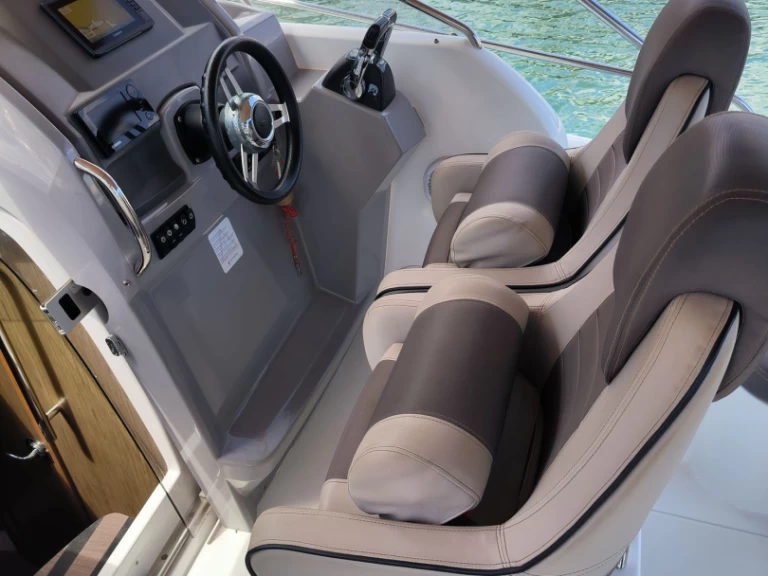 Jeanneau Cap Camarat 8.5 WA charter bareboat or skippered in  Marina De Cala D'Or