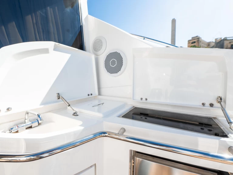 Sunseeker Predator 52 charter bareboat or skippered in  St. Julian's