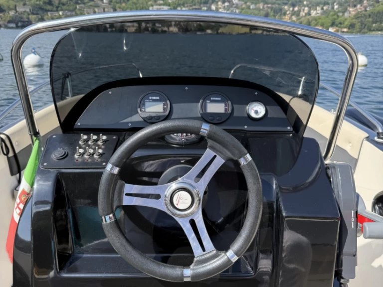 As Marine OPEN 570 charter bareboat or skippered in  Como (City)