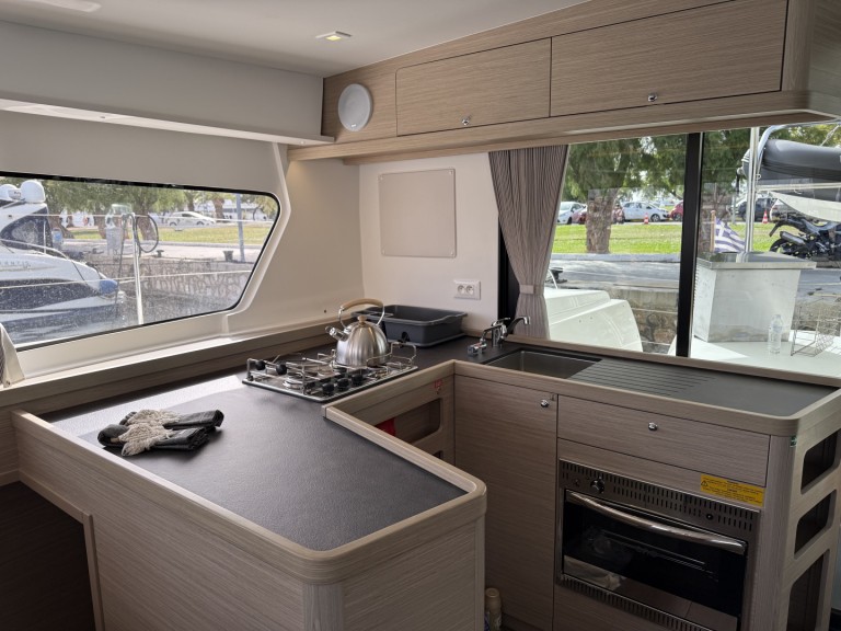 Charter a Lagoon Lagoon 42 in Alimos on Samboat