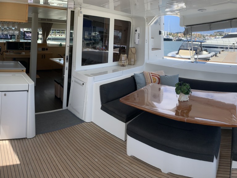 Charter a Lagoon Lagoon 52F ( + crew)  in Santa Eulària des Riu on Samboat
