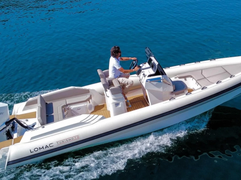 Lomac Turismo 7.0 charter bareboat or skippered in  La Trinité-sur-Mer