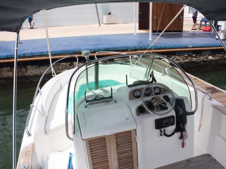 Jeanneau Cap Camarat 625 charter bareboat or skippered in  Fornells