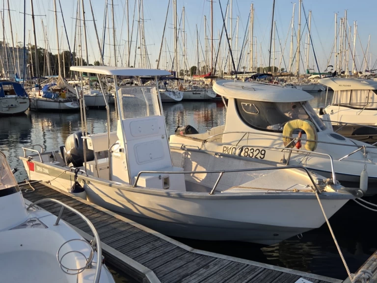 Charter a Pro2000 Open 6000 in Saint-Cyprien-Plage on Samboat