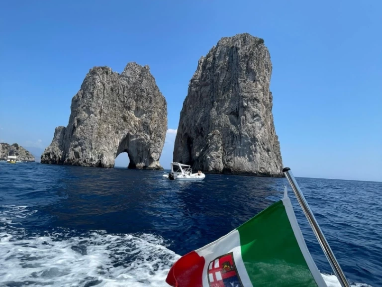 Eolo EOLO 6.9 charter bareboat or skippered in  Salerno