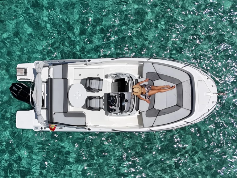 Jeanneau CAP CAMARAT 6,5 CC Style charter bareboat or skippered in  Marina Botafoch