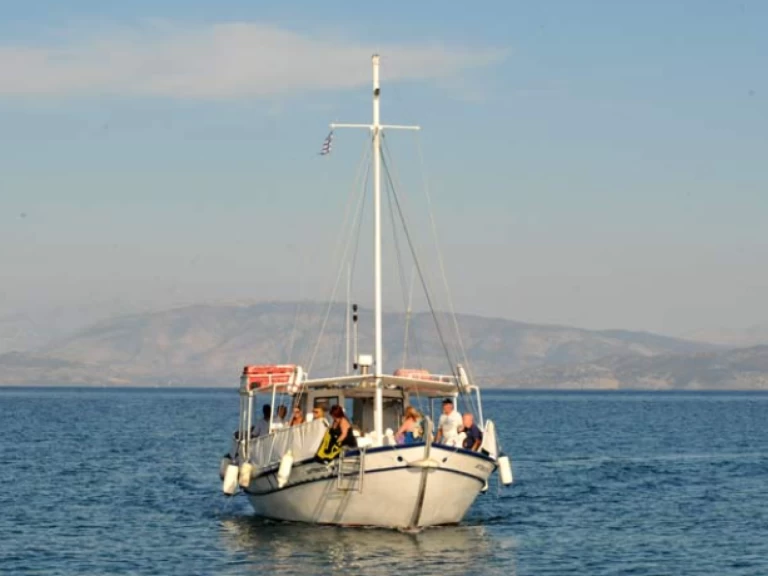 Wooden Boat  Wooden Boat charter bareboat or skippered in  Ipsos