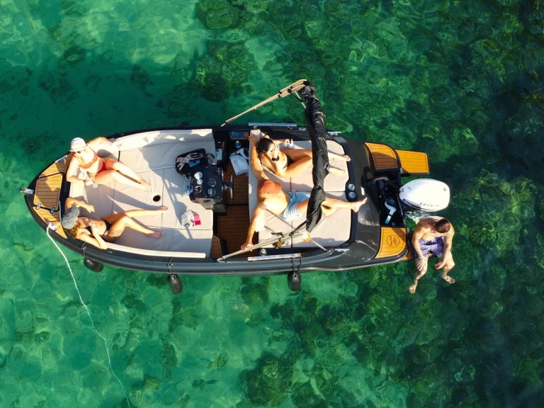 AQUA51 550 charter bareboat or skippered in  Sant Antoni de Portmany