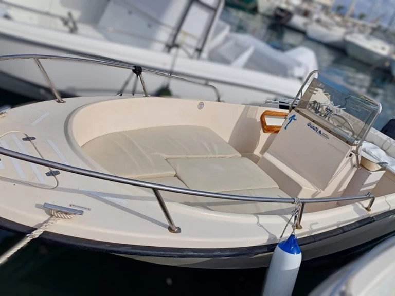 Omnia Omnia 600 charter bareboat or skippered in  Porto di Alghero