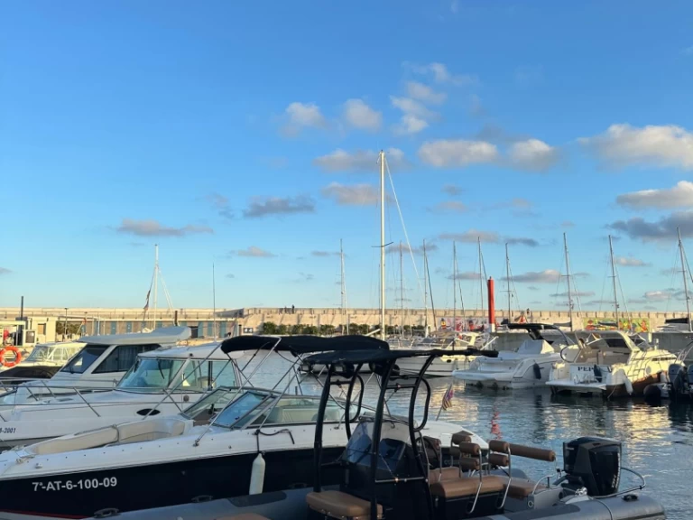 Rio Rio 700 Cruiser charter bareboat or skippered in  Cala d'Or