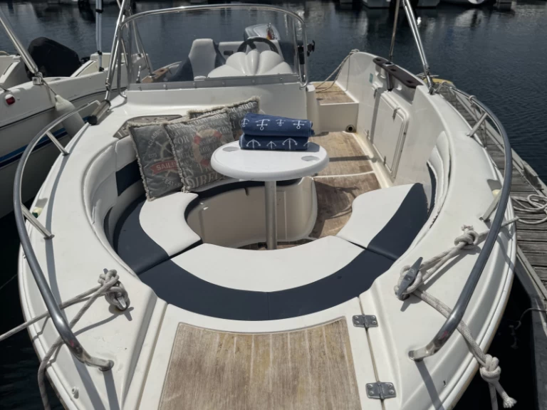Quicksilver Quicksilver 600 Commander charter bareboat or skippered in  Porto Deportivo Sanxenxo