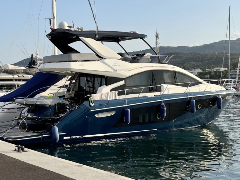 Cranchi E56F charter bareboat or skippered in  Porto di Loano
