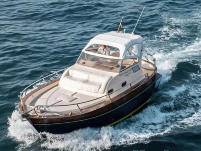 Acquaviva 30 EXE charter bareboat or skippered in  Salerno