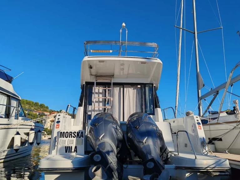 Charter a Jeanneau Merry Fisher 1095 Fly in Drage on Samboat