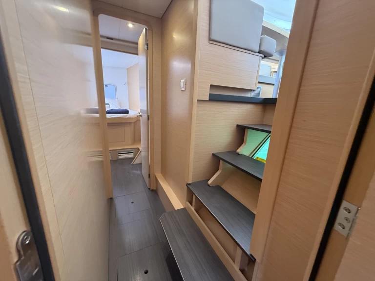 Yacht hire Nikiána cheap Lagoon 42, 2020,  Air Condition, Generator, Water maker, Solar panel, Only with skipper, 2 SUP offered free