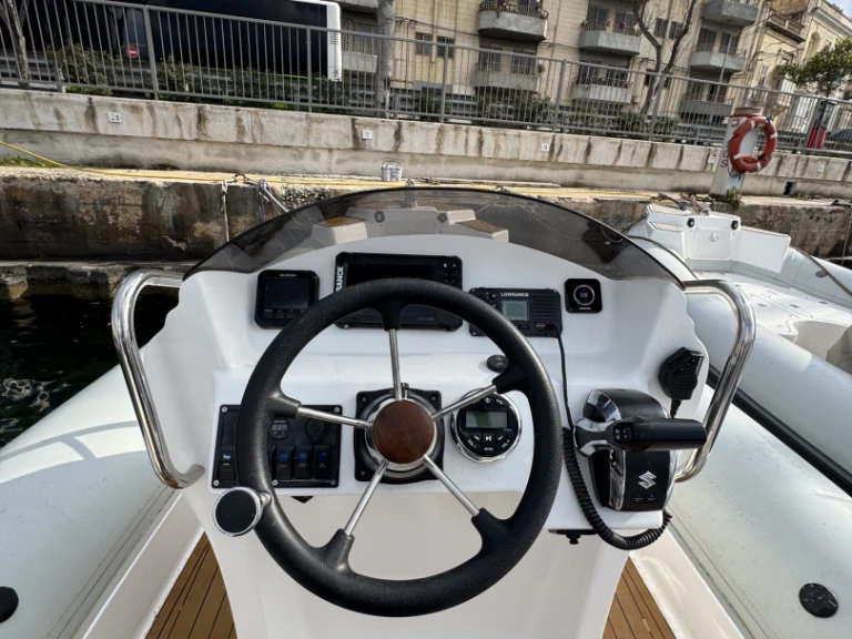 Onda marine 750 charter bareboat or skippered in  Tal-Pietà