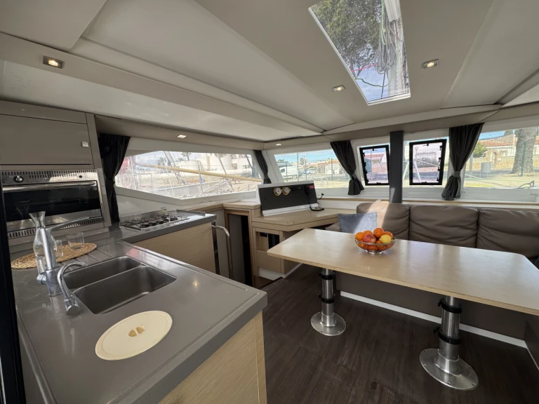 Catamaran to hire Roses at the best price