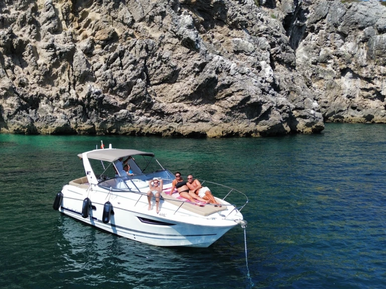 Jeanneau Leader 8 charter bareboat or skippered in  Marina de Tróia