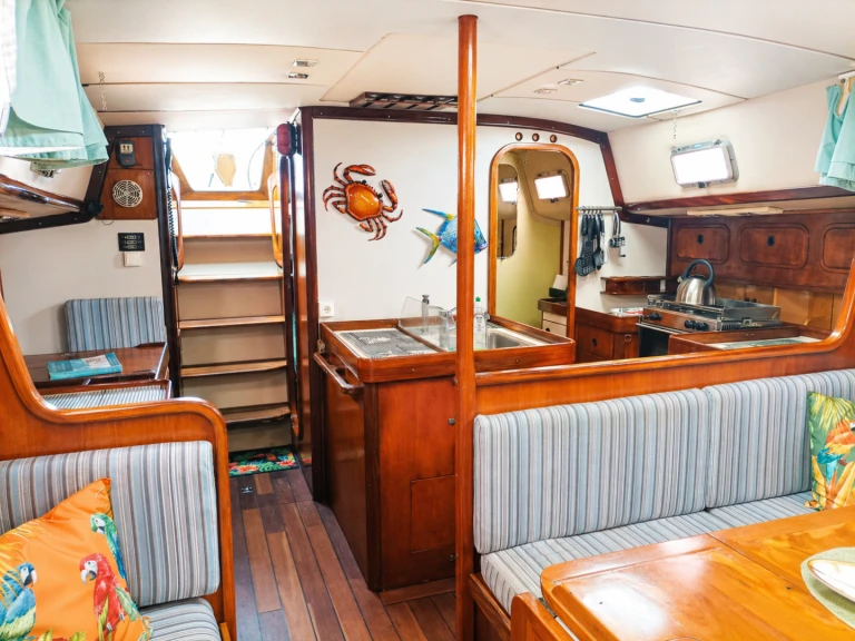 Bénéteau Idylle 13.50 charter bareboat or skippered in  Papeete