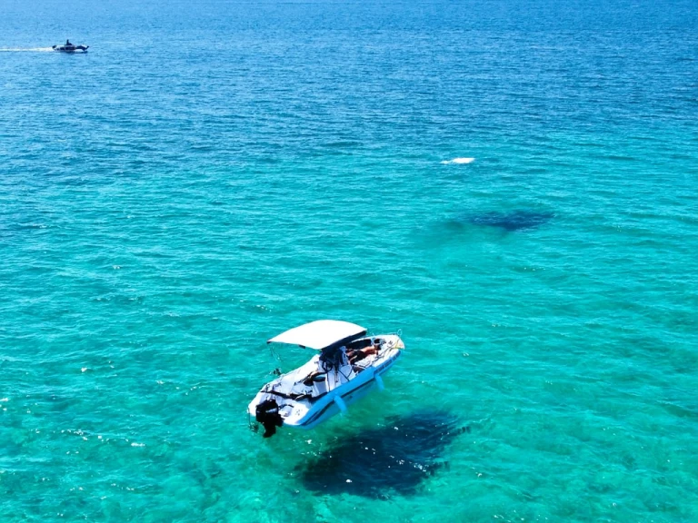 Albatros Open 5.65 charter bareboat or skippered in  Porto Cesareo