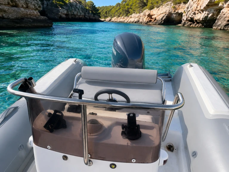 Bwa Bwa 650 charter bareboat or skippered in  Can Picafort
