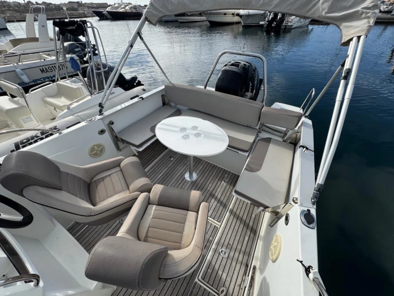 Jeanneau Cap Camarat 7.5 WA Serie 2 charter bareboat or skippered in  Empuriabrava