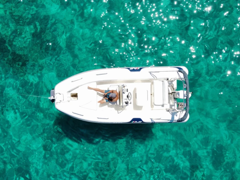 Charter a Quicksilver Activ 595 Cruiser in Porto San Paolo on Samboat