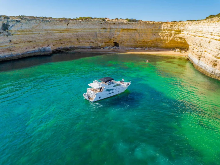 Pearl fly bridge 55 charter bareboat or skippered in  Vilamoura