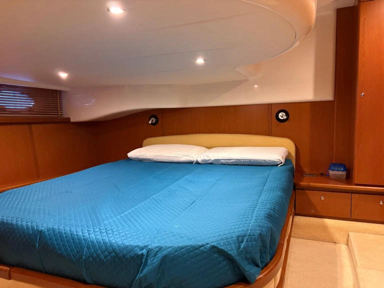 Azimut Atlantis 42 charter bareboat or skippered in  San Teodoro