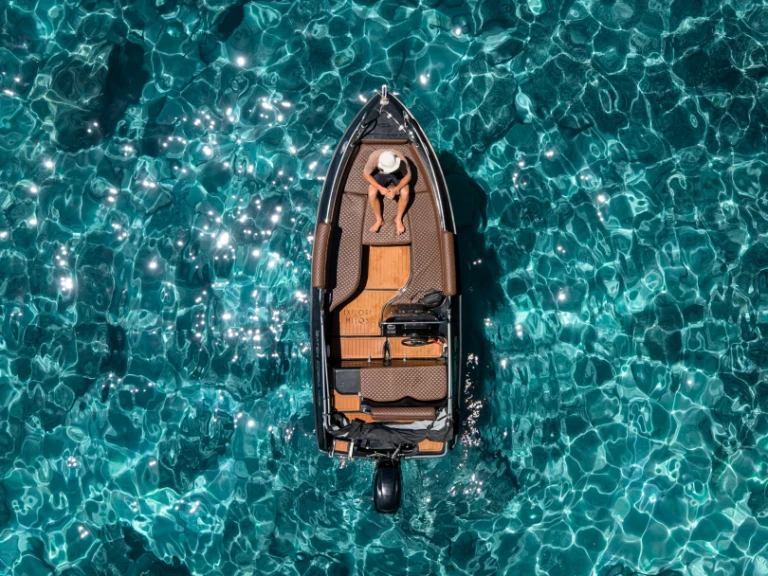 Isatek Cobra 495 charter bareboat or skippered in  Mílos