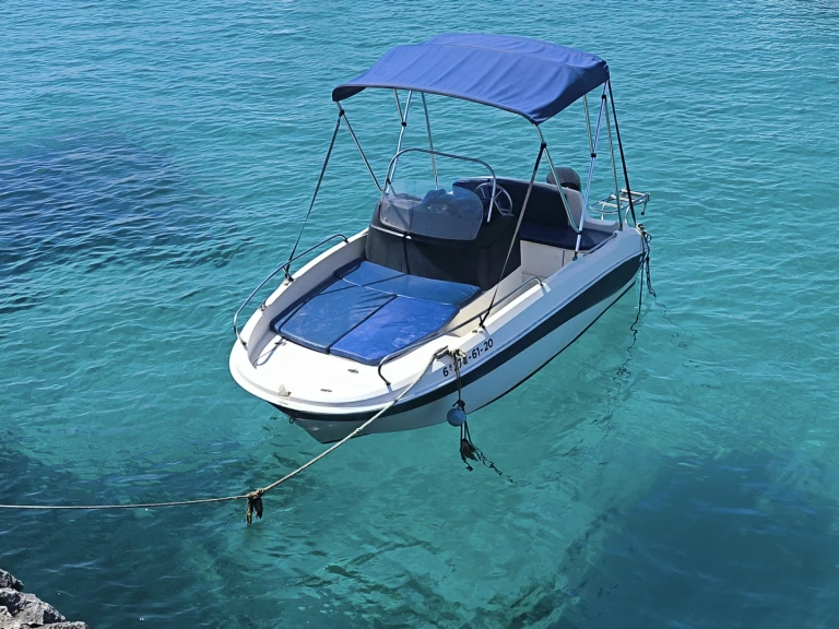 Charter a Remus Remus 450 open in Ciutadella de Menorca on Samboat