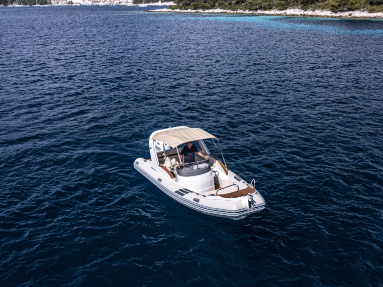 Aquamax B 23 F charter bareboat or skippered in  Hvar
