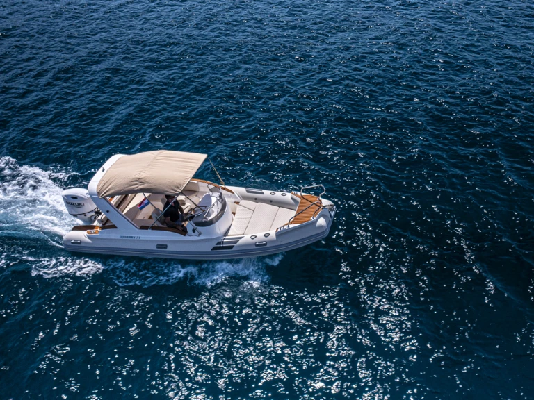 Aquamax B 23 F charter bareboat or skippered in  Hvar