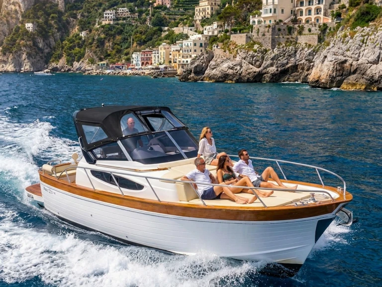 Gozzo Libeccio 32WA charter bareboat or skippered in  Sorrento