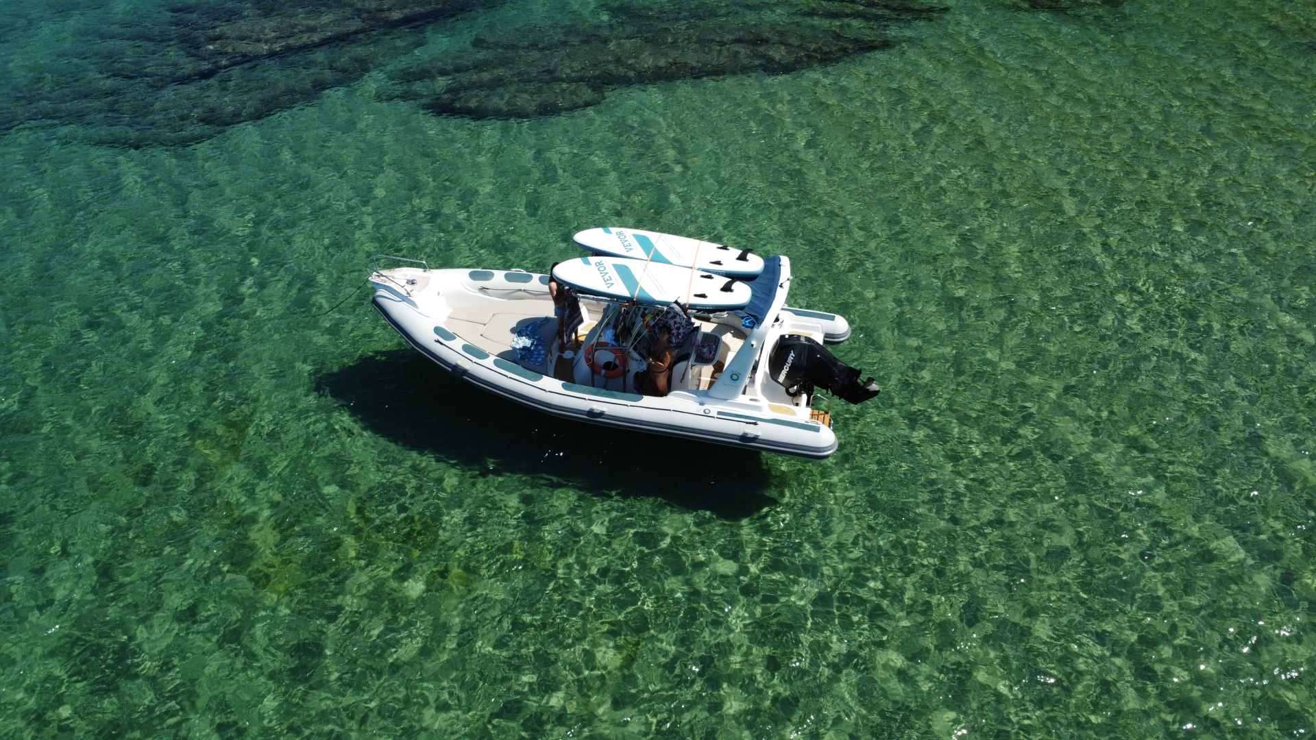 Astec day cruiser 800 charter bareboat or skippered in  Fornells