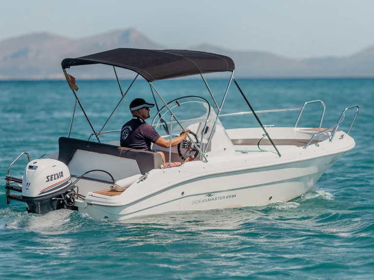 Ocean Master 470 wa charter bareboat or skippered in  Can Picafort